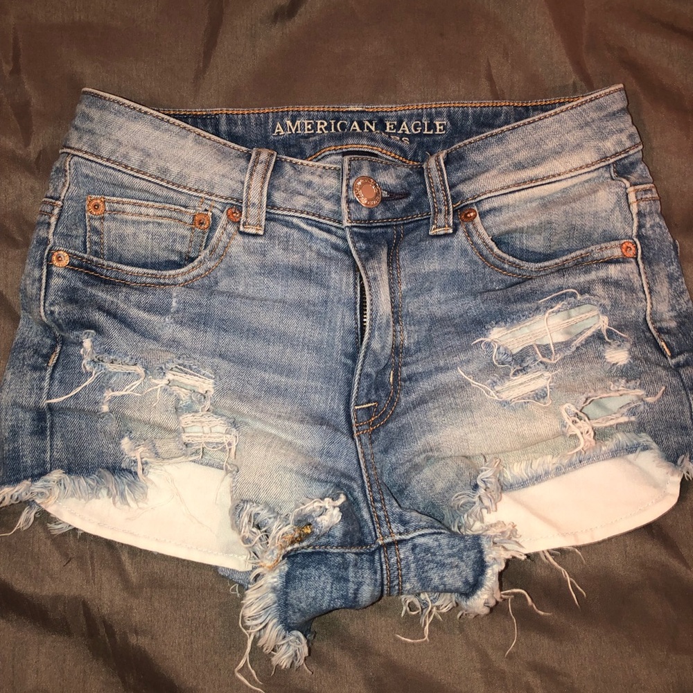 Light blue distressed jean shorts.